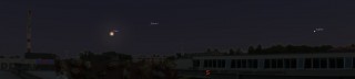 Kesköine vaade AHHAA katusel, kus on näha nii varjutuses Kuu kui planeedid Jupiter ja Saturn.