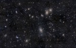 Neitsi galaktikaparve süda, kus on näha omavahel põrkuvaid hiidgalaktikaid. Parves on kokku umbes 2000 individuaalset liiget. Allikas: Wikipedia
